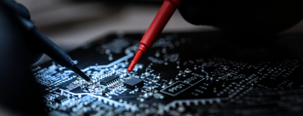 Closeup Of Technician Repairing Peace Of Motherboard Using Profe
